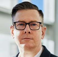 Photo du directeur général Alexander Hughes, leader d'une société de négoce de cryptomonnaies